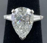 Platinum Pear and Tapered Baguette Natural Diamond RIng