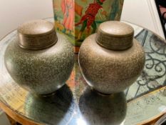 Pair of Lidded Urns