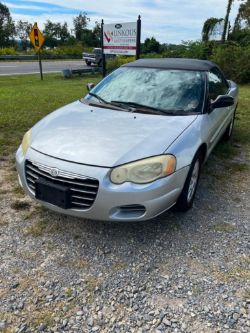 Online 1930 Four Door Town Sedan, 2004 Chrysler Sebring Convertible and Mini Skid Steer