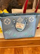 Light Blue Louis Vuitton Handbag