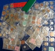 Coins, a collection of uncirculated coins presented in sealed plastic packs from a range of