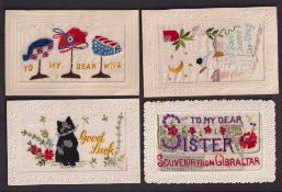 Postcards, Silks, 4 better embroidered silk postcard designs, inc. 'Good Luck' showing seated