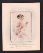 Tobacco silk, J W Kolff & Co, Rotterdam, small picture of beauty opening jewellery box (padded