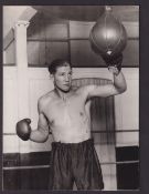 Boxing press photographs, a folder containing 46 b/w photos boxing photos including weigh-in, action