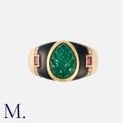 CARTIER. A Chrysoprase, Ruby and Diamond Ring in 18K yellow gold, set with a carved chrysoprase to