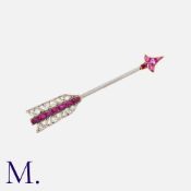 CARTIER , An Art Deco Ruby And Diamond Arrow about Pin in yellow gold and platinum, designed as an