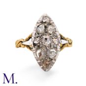 A Rose Cut Diamond Navette Ring in yellow gold and silver, the navette shaped face set throughout