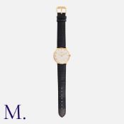 LONGINES A Vintage Gents Wristwatch in 9k yellow gold, the silvered dial with baton hour markers.