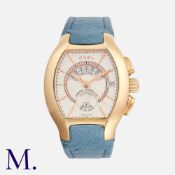 Ebel. An 18ct yellow gold Ebel chronograph wristwatch, automatic movement, the barrel shaped dial