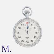 HEUER, A Vintage Sixty Seconds Stopwatch, manual wind movement, requires service. Accompanied by