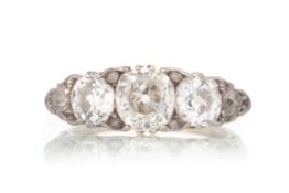 VERY IMPRESSIVE DIAMOND FIVE STONE RING,