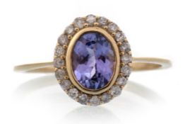TANZANITE AND DIAMOND RING,