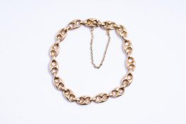 14kt yellow gold coffee bean link bracelet. 
The bracelet is finished with a beautiful ornate clasp 