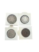 A collection of coins consisting of a silver rijksdaalder: Wilhelmina with coarse hair, an East Afri