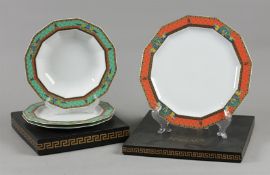 A lot of porcelain plates consisting of a dinner plate, two breakfast plates and a soup plate with L