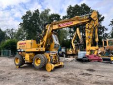 O & K MH5 WHEELED EXCAVATOR WITH RAILWAY GEAR, 3 PIECE BOOM AND HYDRAULIC JACK LEGS *PLUS VAT*