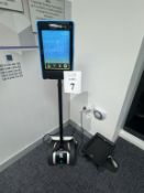 TELEPRESENCE ROBOT WITH DOUBLE ROBOTIC CHARGING DOCK,