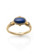 A gold and lapis lazuli ring