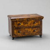 A PROBABLY FRENCH MODEL COMMODE