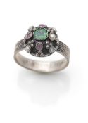 A silver and gemstone 