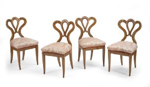 A set of four Biedermeier cherrywood side chairs