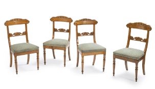 A French set of cherrywood and brass-inlaid side chairs