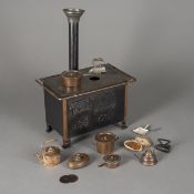 Model or doll's cooker with accessories