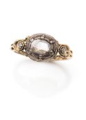 A gold and diamond ring