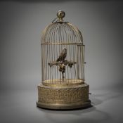 A BIRD CAGE WITH AUTOMATE