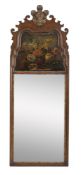 An English parcel-gilt mahogany pier glass