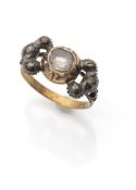 A gold and rok crystal ring