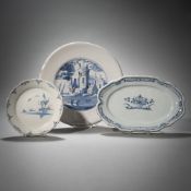 A FAIENCE ROUND DISH, AN OVAL DISH AND A PLATE