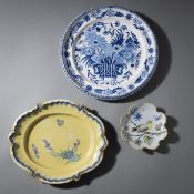TWO FAIENCE DISHES AND A PLATE