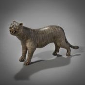 A CARVED WOOD FIGURE OF A PREDATORY CAT