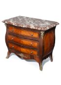 A FRENCH LOUIX-XV-STYLE BRASS MOUNTED KING WOOD MODEL COMMODE