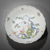 A MEISSEN ROUND DISH WITH ROCK AND BIRD PATTERN