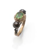 A gold and gemstone ring