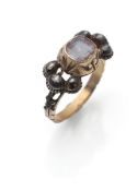 A gold and rock crystal ring