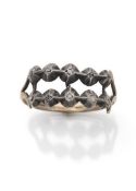 A gold and diamond reviere ring