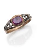 A gold and ruby ring