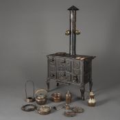 Model or doll's cooker with accessories