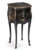 A French black and polychrome lacquered commode