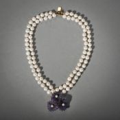 A FOUR ROW PEARL BRACELET