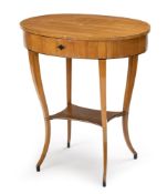 An Austrian cherrywood and ebonised worktable