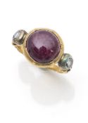 A gold and ruby ring