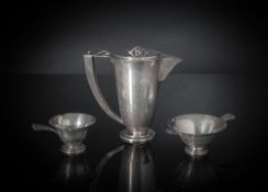 AN ART NOUVEAU COFFEE POT, A MILK POT AND A SUGAR BOWL