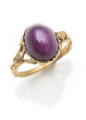 A gold and star ruby ring