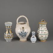 A HANDLED JAR, A PLUTZER AND TWO SMALL POTS