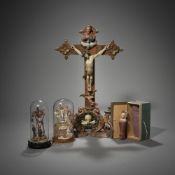 A CRUCIFIX TWO CALVARIES AND AN INFANT