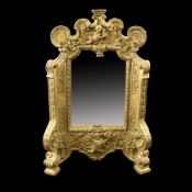 A WOODCARVED ALTAR FRAME AS MIRROR